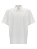 Chemise polo blanche Givenchy en coton, vue rapprochée du tissu et du col, élégante et classique.