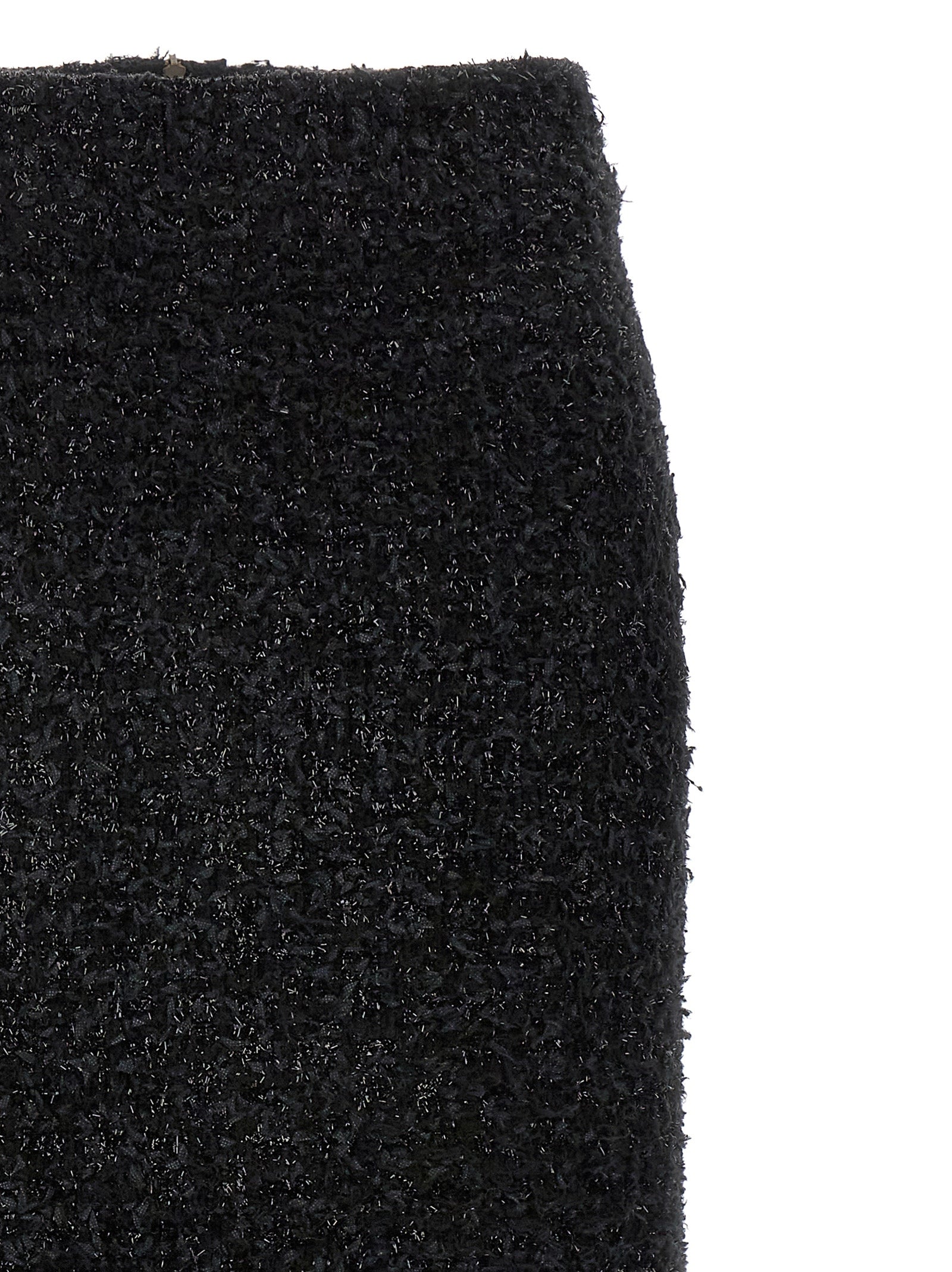 Jupe midi noire en coton de la marque Balenciaga, style élégant et tendance, visible avec sa coupe fluide et tissu doux.