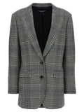 Blazer en laine bicolore Dolce & Gabbana porté sur mannequin, détails élégants et coupe moderne visible dans l'image.