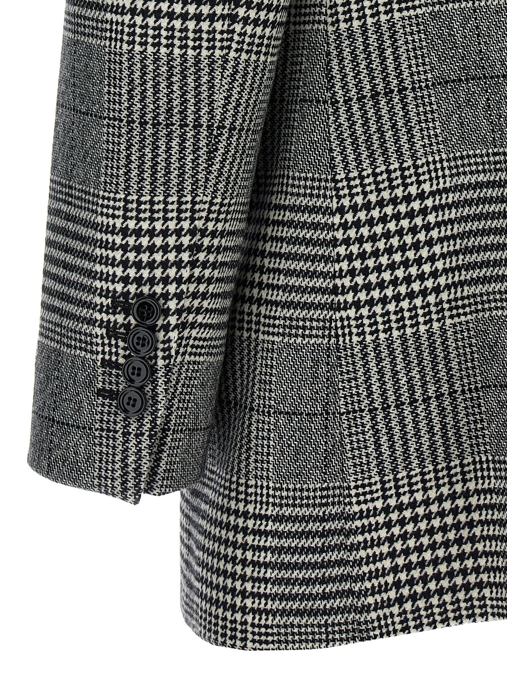 Blazer en laine bicolore de Dolce & Gabbana, élégant et moderne, porté sur un mannequin pour une tenue sophistiquée.