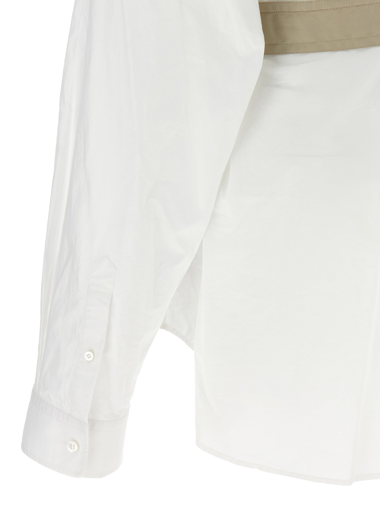 Chemise blanche en coton de la marque Balenciaga, avec un design élégant et classique, visible en détail dans l'image.