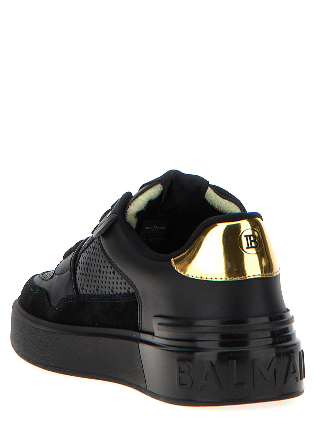 Baskets Balmain en cuir de veau noir avec détails élégants, semelle blanche et design moderne.