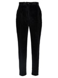 Pantalon noir en coton Dolce & Gabbana pour femme, coupe élégante et tissu confortable, porté avec une chemise blanche.