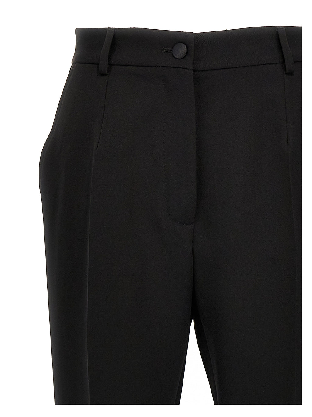 Costume de smoking noir en laine vierge de Dolce & Gabbana, veste élégante avec boutons et revers en satin.