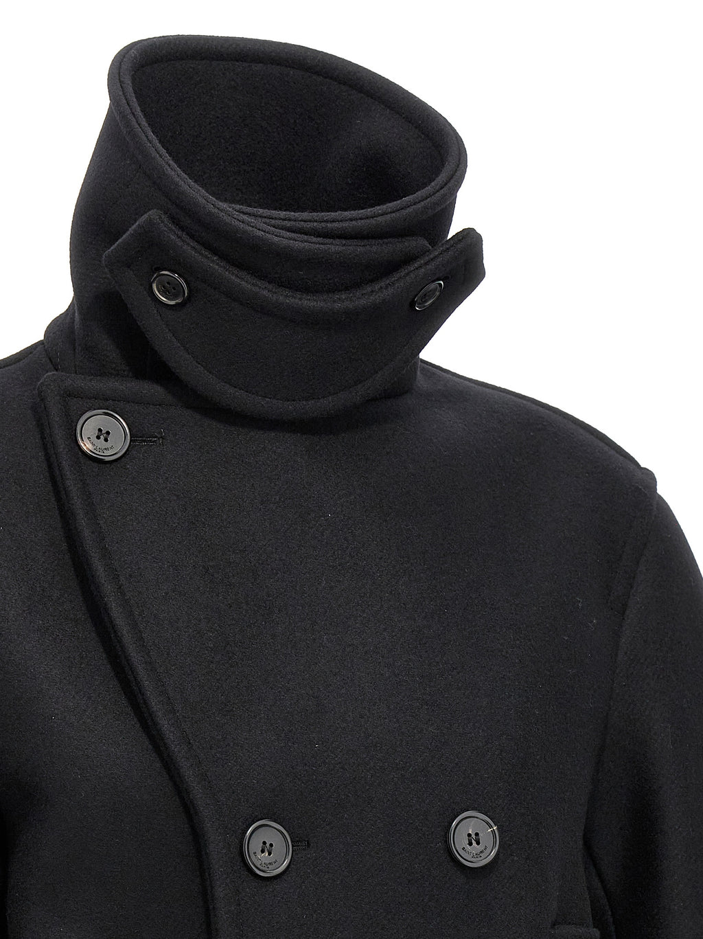 Manteau noir en laine vierge de Saint Laurent, coupe élégante et classique, porté sur un mannequin.