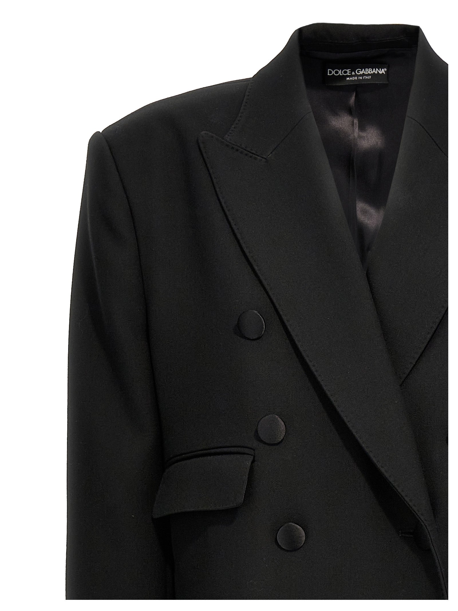 Manteau noir en laine vierge de Dolce & Gabbana, coupe classique avec col élégant et poches latérales.