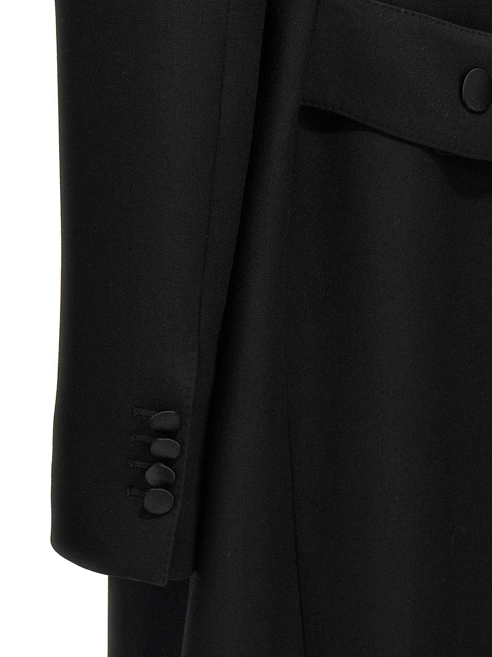 Manteau en laine vierge noire de Dolce & Gabbana, coupe élégante avec col classique et détails sophistiqués.
