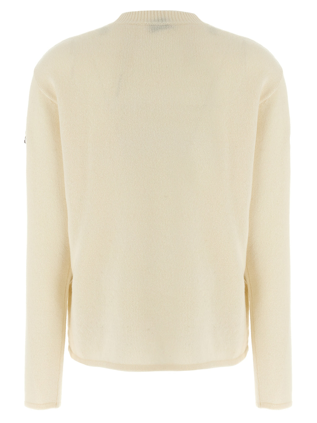 Cardigan blanc en laine MONCLER GENIUS porté sur un modèle, détails de texture et coupe élégante visibles.
