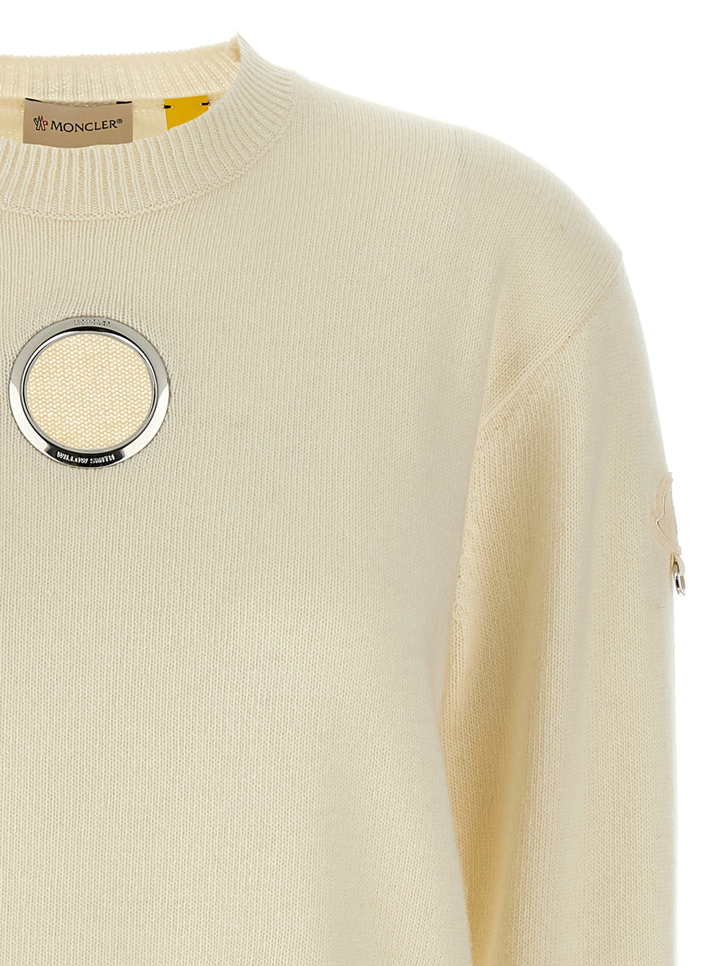 Cardigan en laine blanche MONCLER GENIUS, élégant et confortable, porté sur un mannequin.