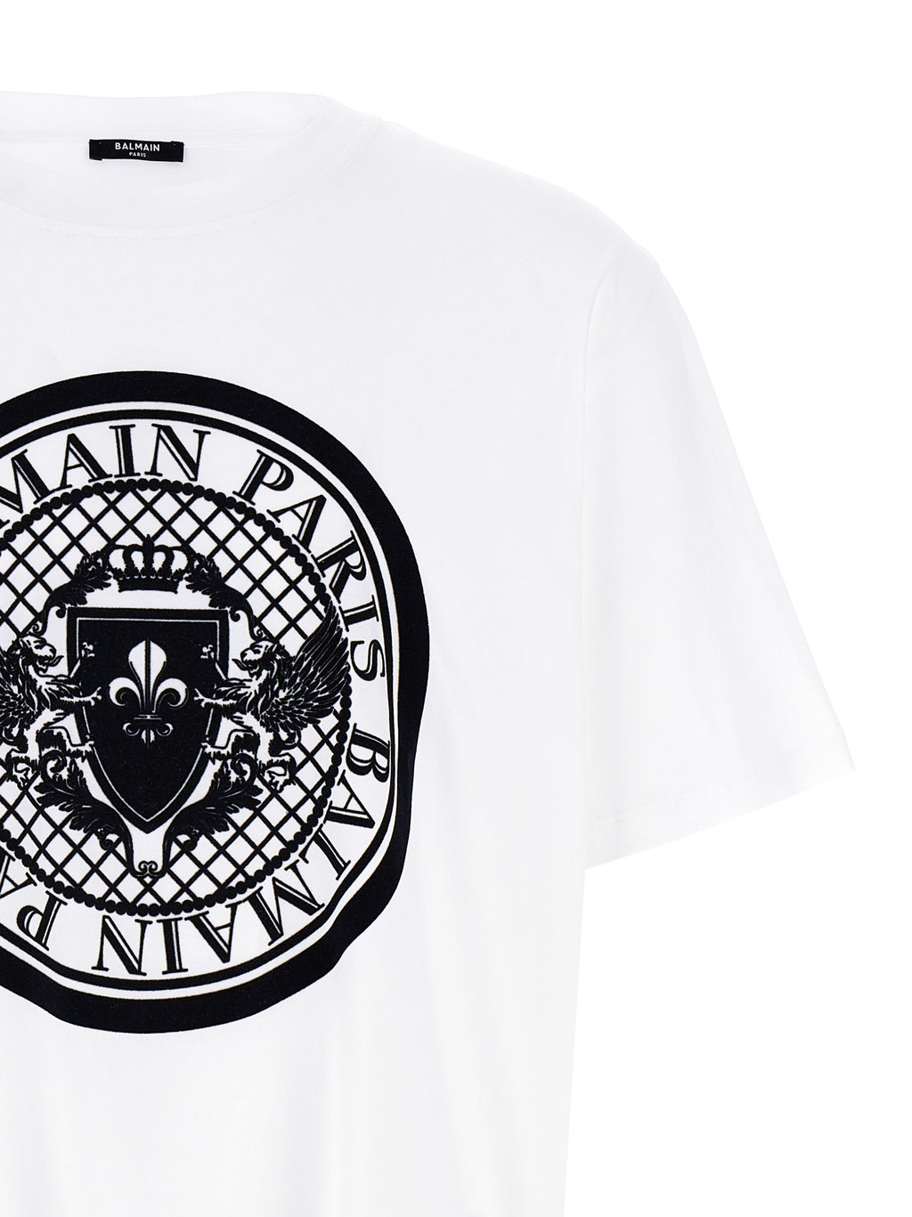 T-shirt en coton bio bicolore Balmain avec logo, manches longues, style moderne et élégant, porté sur mannequin.