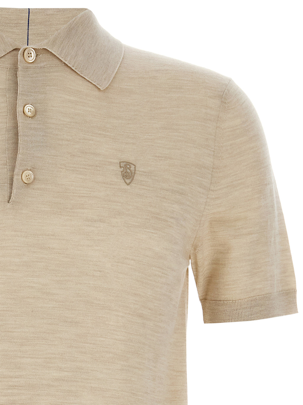 Chemise polo en laine beige Burberry, vue de face, avec col et logo emblématique visible, style classique et élégant.