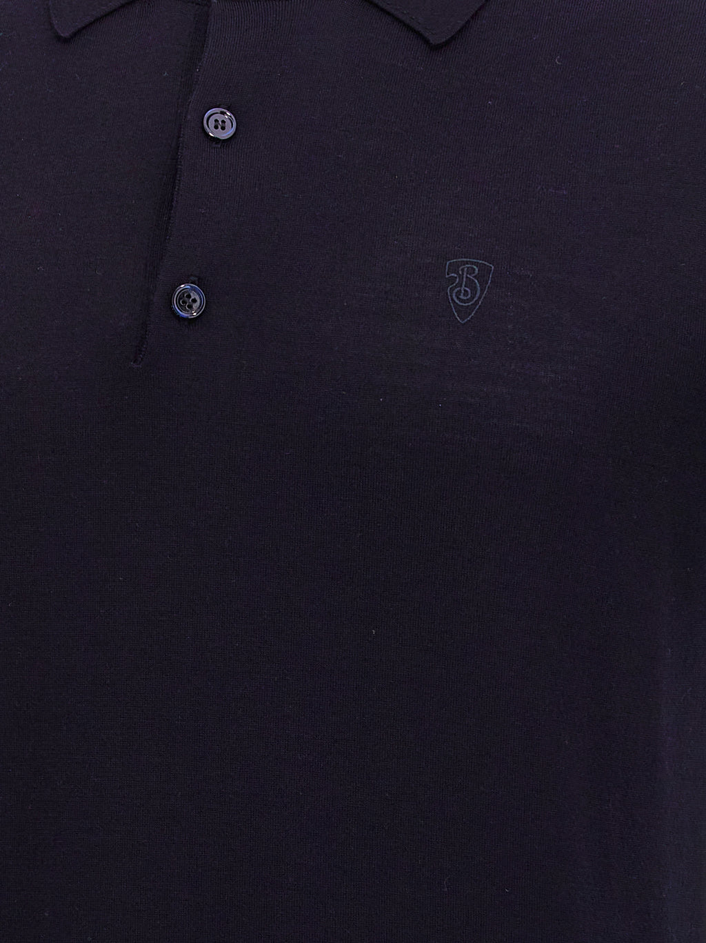 Chemise polo en laine bleue Burberry, vue détaillée du tissu et du col, élégante et classique pour homme.