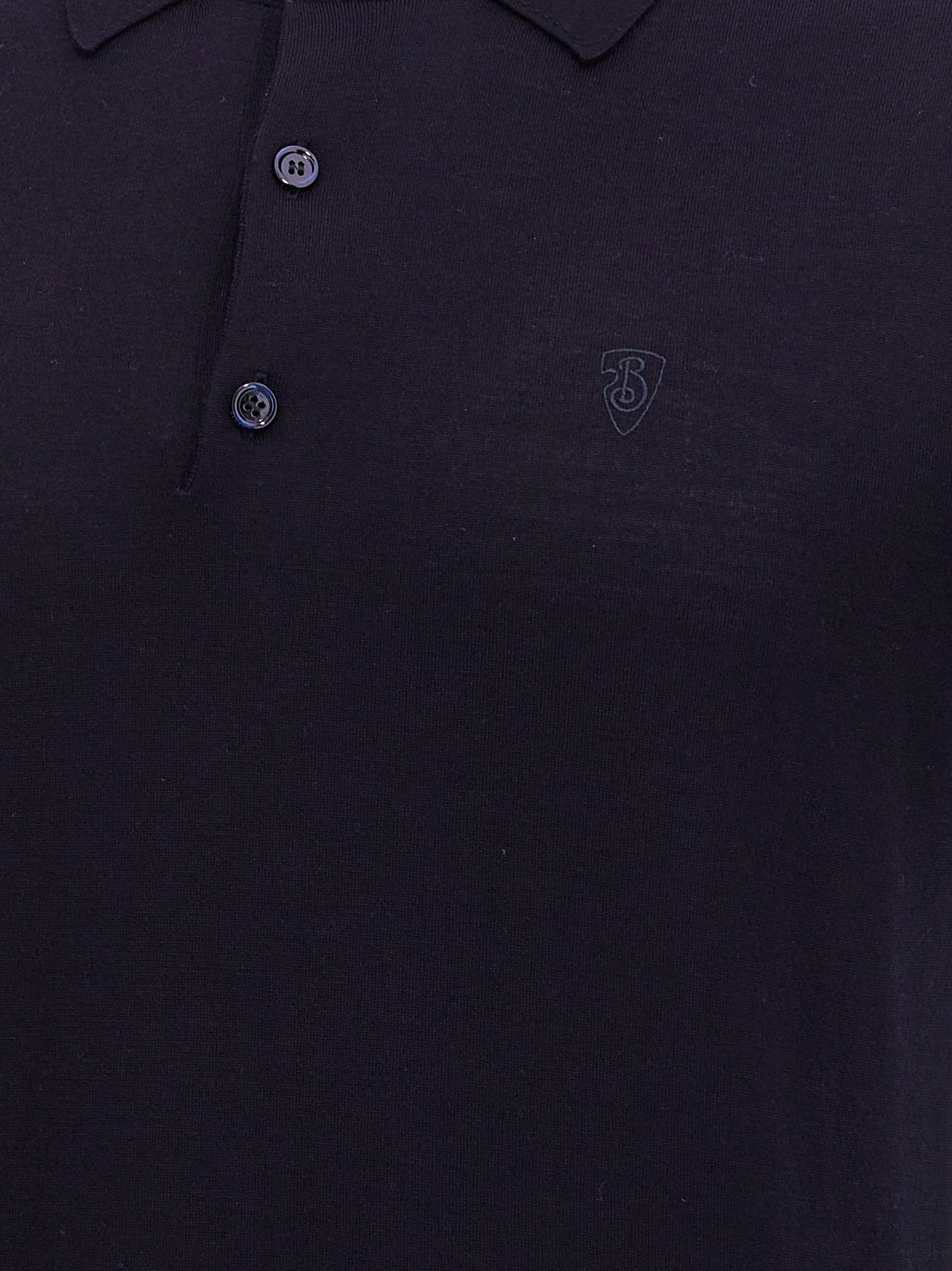 Chemise polo en laine bleue Burberry, vue détaillée du tissu et du col, élégante et classique pour homme.