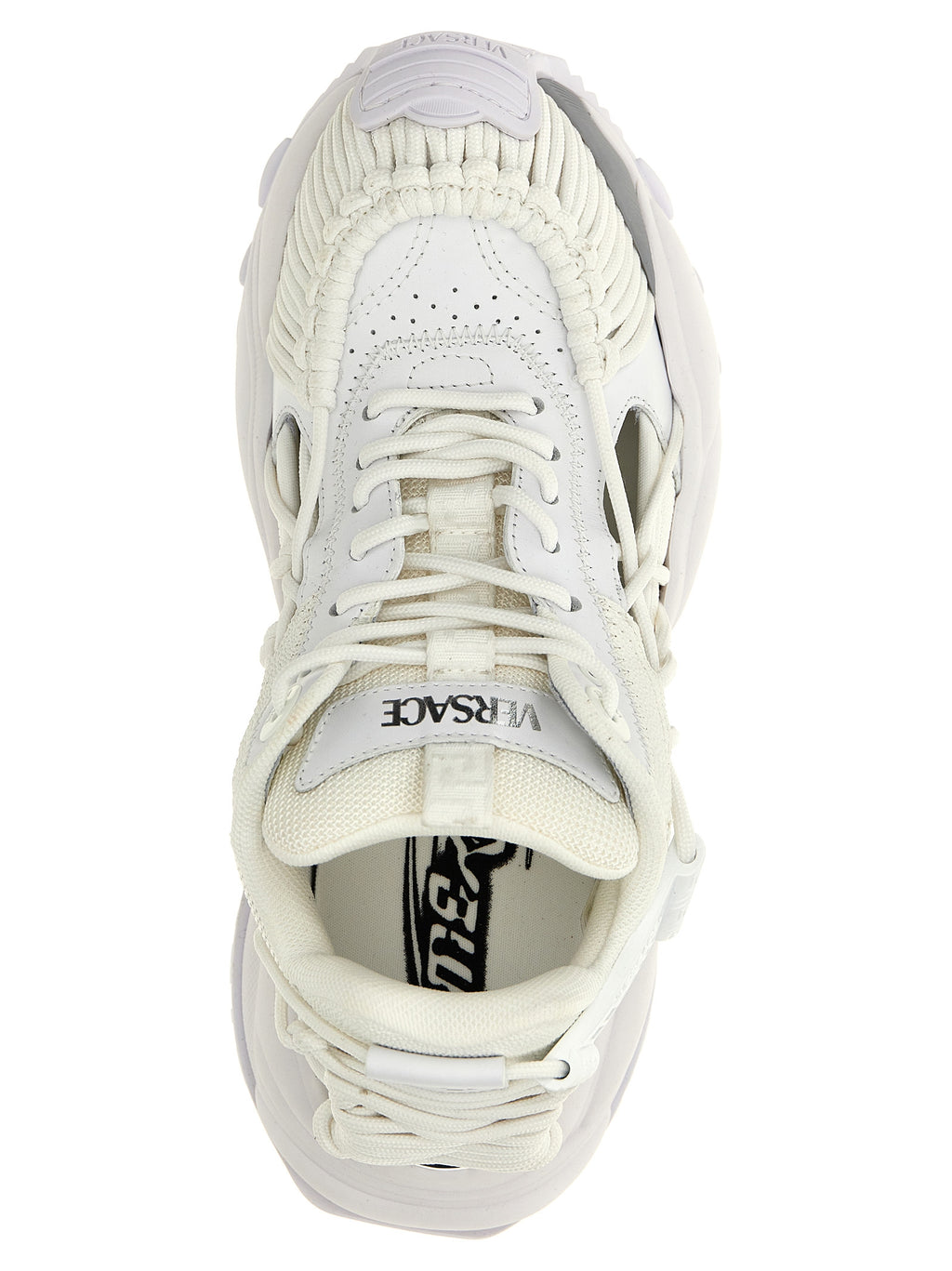Sneakers athlétiques blanches en cuir de veau Versace avec logo distinctif et design moderne.