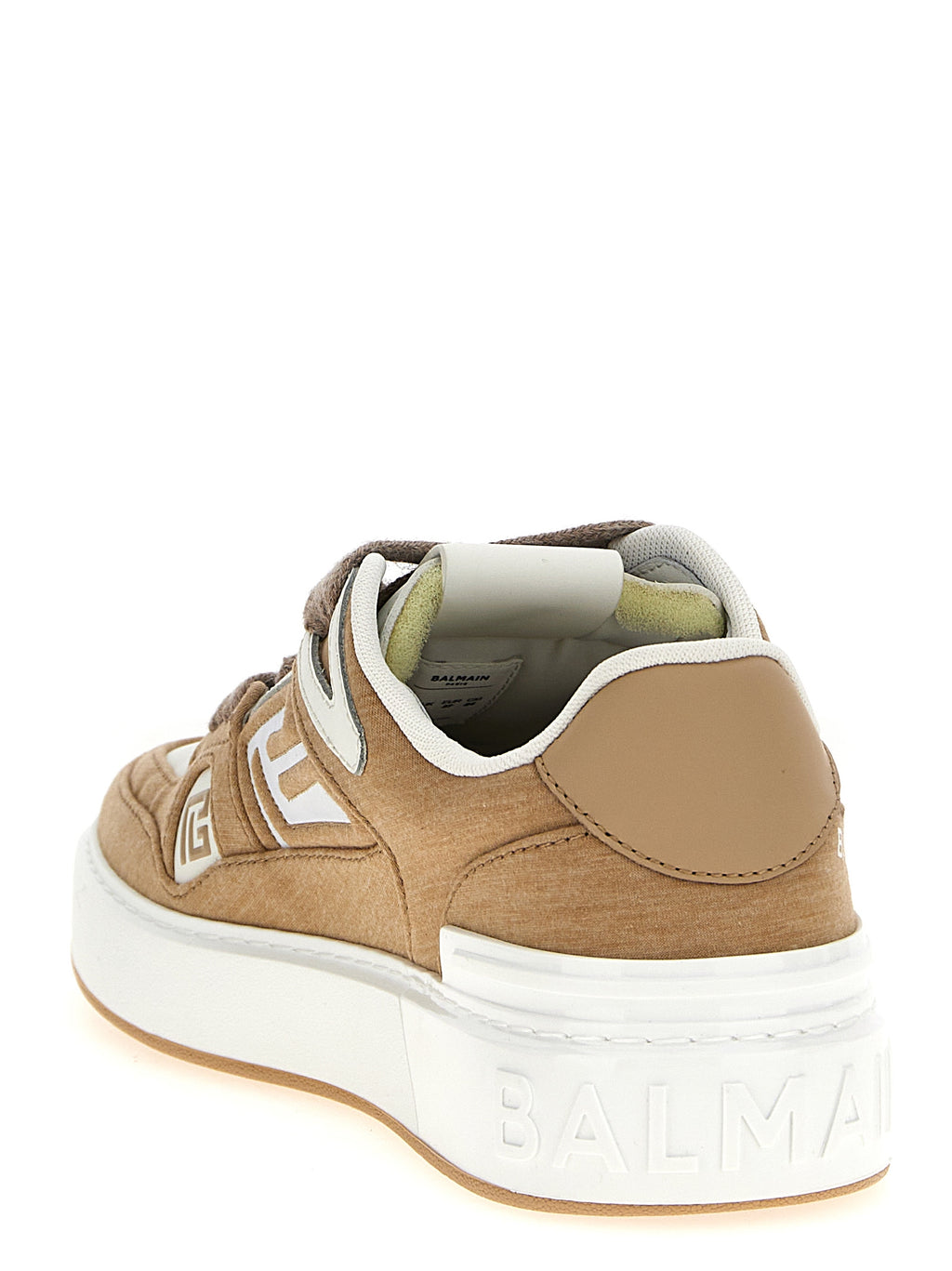 Baskets basses en polyester beige de la marque Balmain, vue de face avec détails de design moderne.