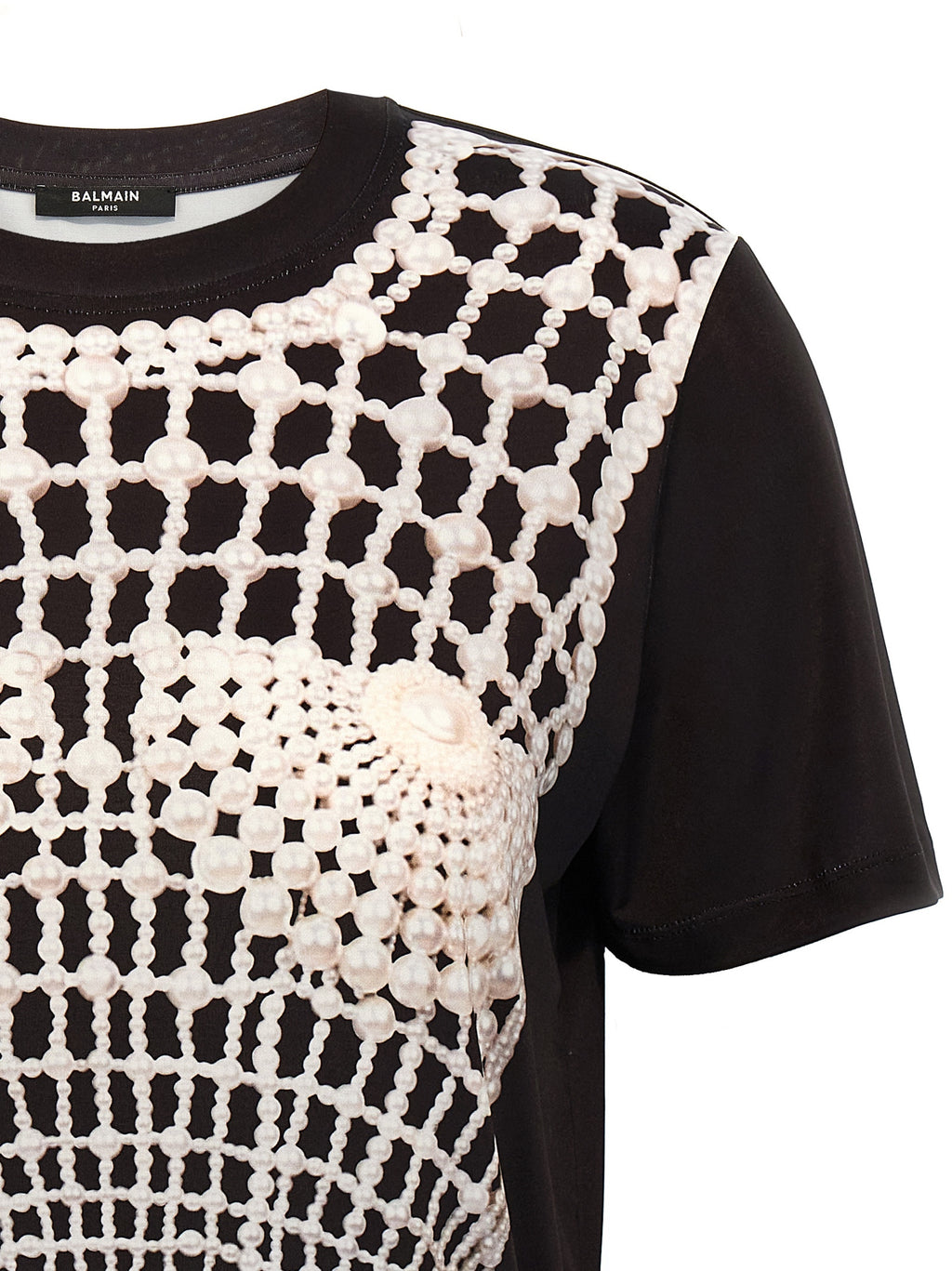 T-shirt noir en coton biologique de la marque Balmain, coupe classique avec logo discret sur la poitrine.