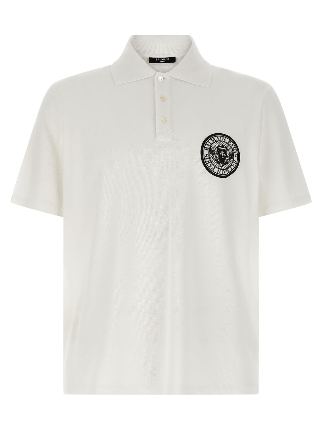 Chemise polo en coton bicolore Balmain avec col contrasté et logo brodé, vue de face.