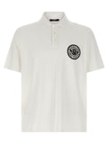 Chemise polo en coton bicolore Balmain avec col contrasté et logo brodé, vue de face.