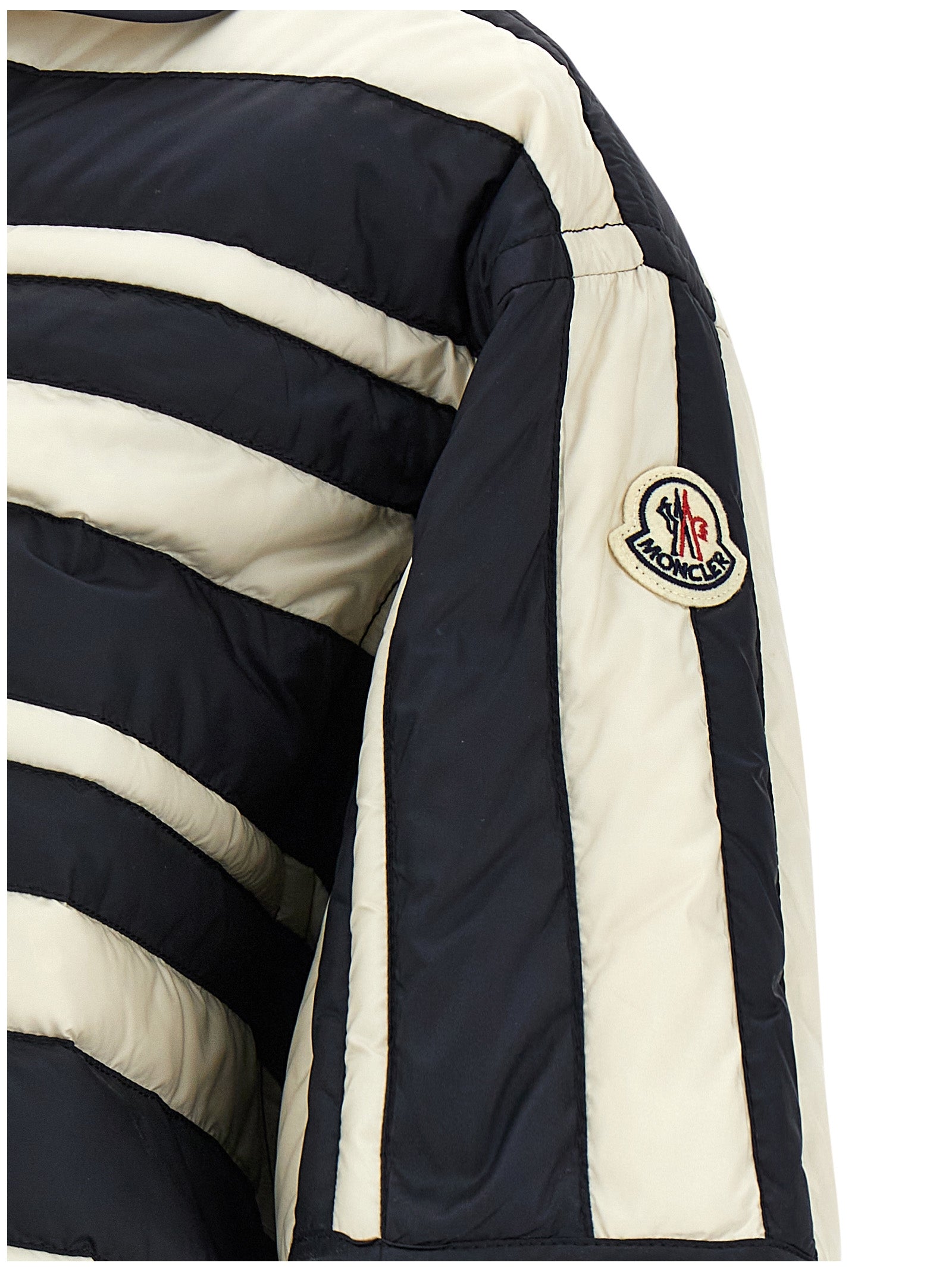 Chemise en polyamide multicolore Moncler avec col élégant et coupe moderne, visible en gros plan dans l’image.