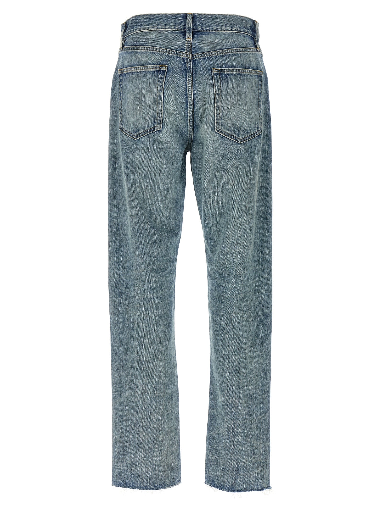 Jean homme Fear Of God en coton bleu, coupe droite, détails modernes et style décontracté, visible sur l'image.