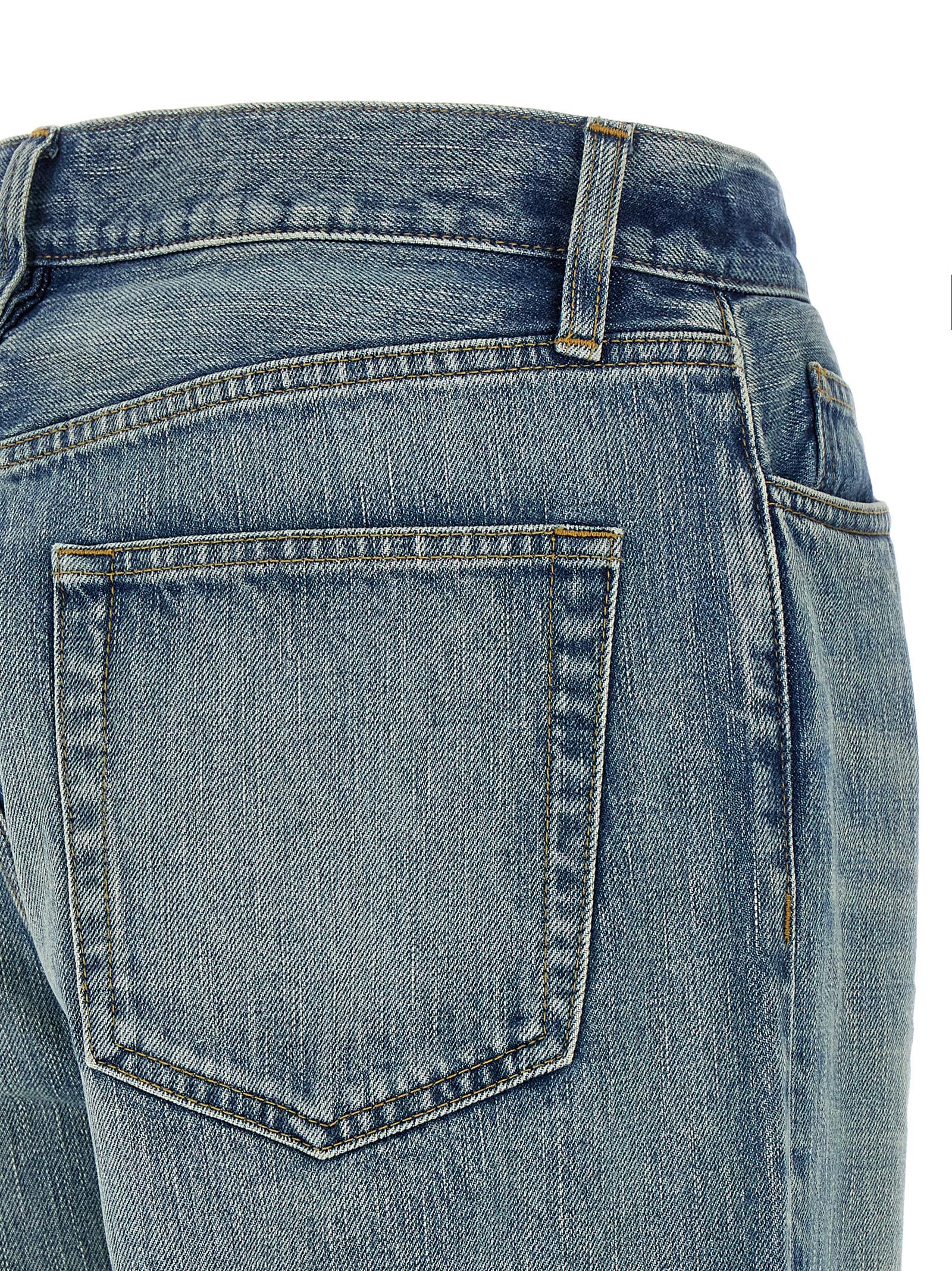 Jeans droits en coton bleu Fear Of God, style classique, visible avec poches et finition soignée.