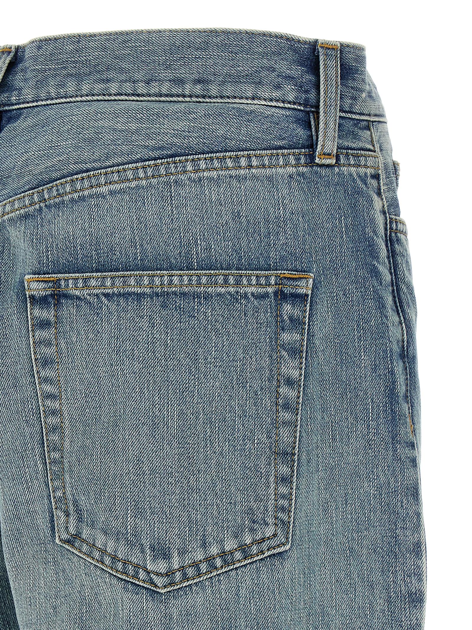 Jeans en coton bleu Fear Of God Denim, coupe classique, visible détail des poches et coutures, mode décontractée.