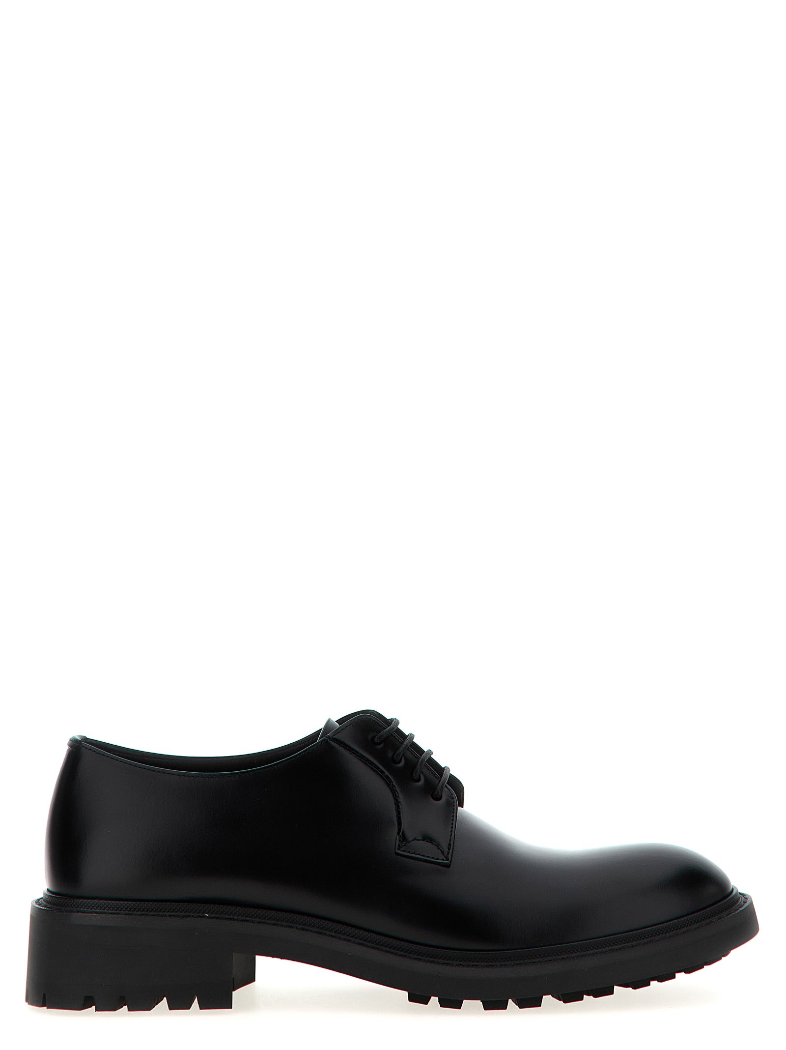 Chaussures Saint Laurent en cuir d'agneau noir, oxfords et derby élégants pour homme, avec couture soignée et semelle en cuir.