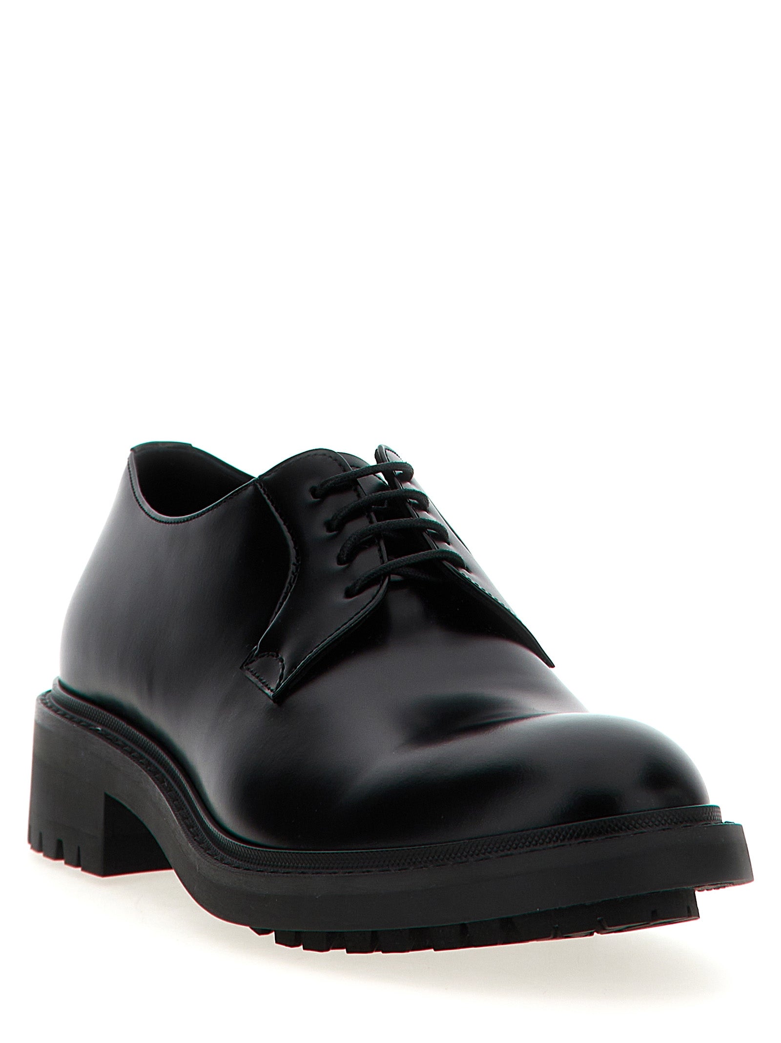 Chaussures oxfords et derbies en cuir d'agneau noir de Saint Laurent, élégantes et sophistiquées, vues de face.