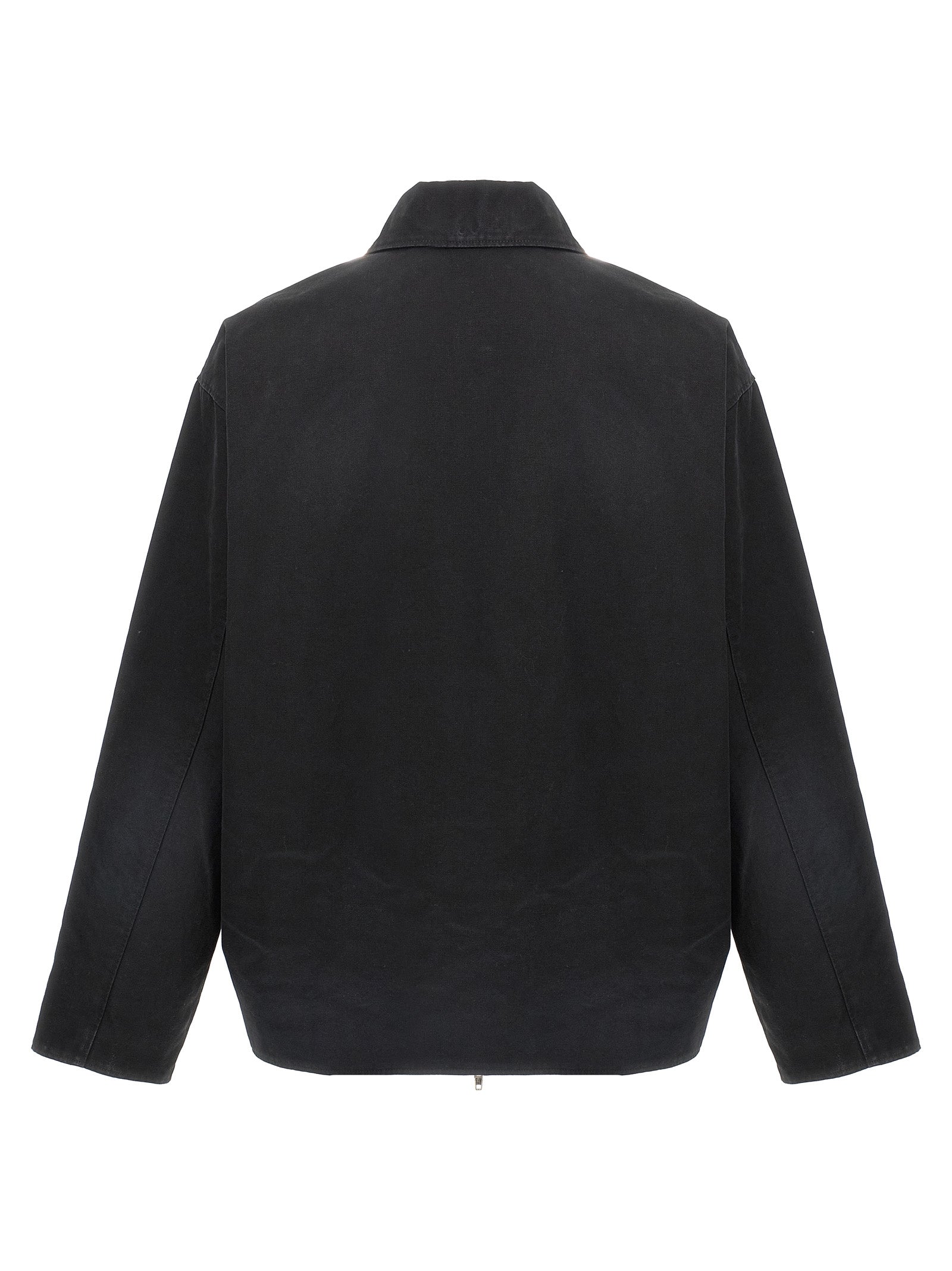 Veste longue en coton noir de Balenciaga, style moderne et élégante, visible en détail sur l'image.