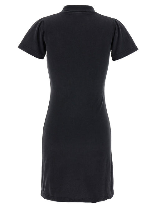 Robe courte noire en coton de Balenciaga, élégante et décontractée, avec un design moderne et une coupe ajustée.