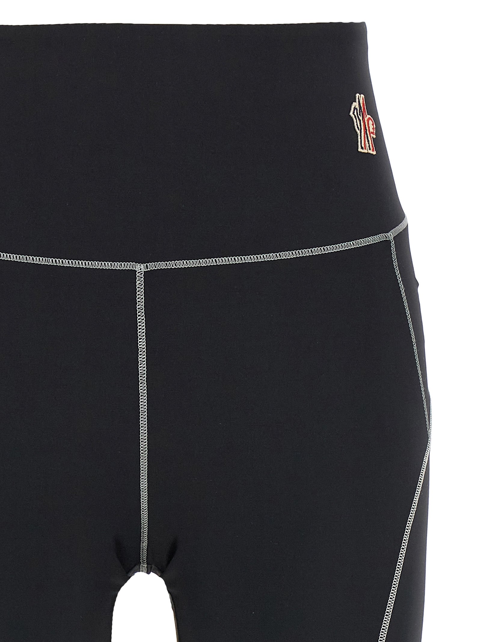 Leggings en polyamide noire Moncler Grenoble, ajustés et élégants, pour un style sportif et sophistiqué.