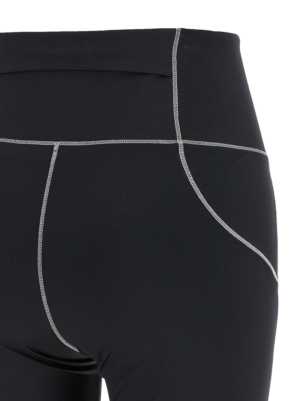 Leggings en polyamide noire Moncler Grenoble, ajustés, avec détails techniques visibles pour un look sportif et moderne.