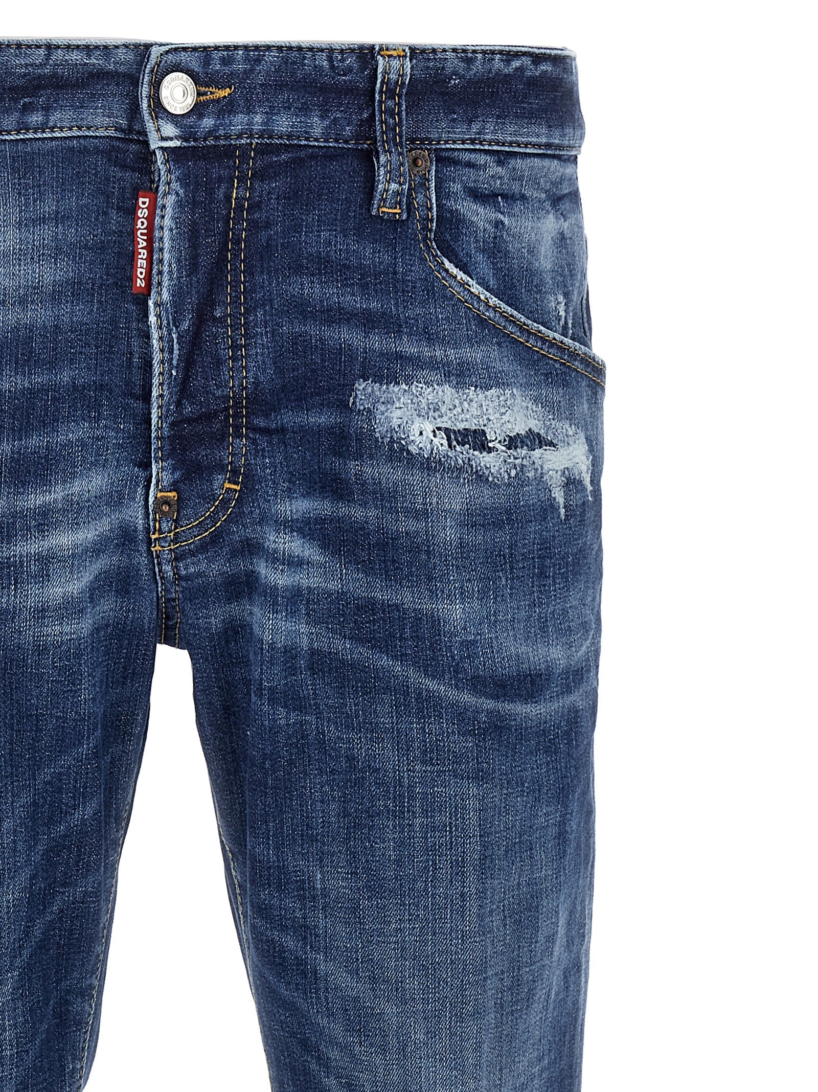 Jeans skinny en coton bleu Dsquared², ajustés et modernes, visibles en gros plan sur fond neutre.