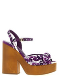 Sandales à talons stilettos en coton violet de Dolce & Gabbana, montrant les détails élégants et le design sophistiqué.