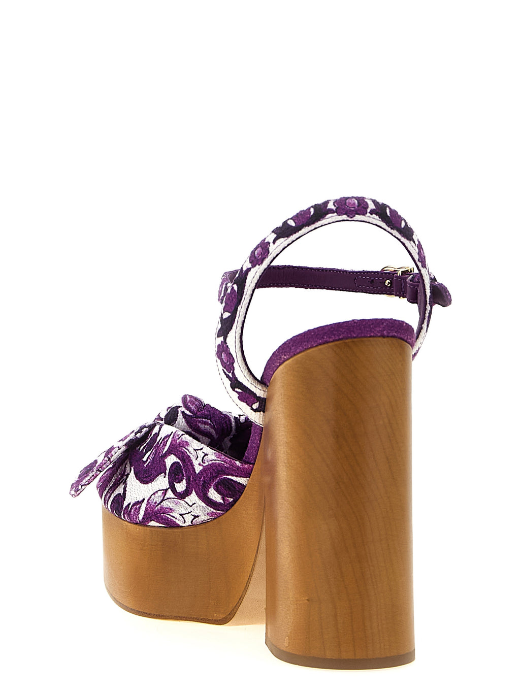 Sandales à talons stilettos en coton violet de Dolce & Gabbana, visibles avec leurs détails élégants et design sophistiqué.