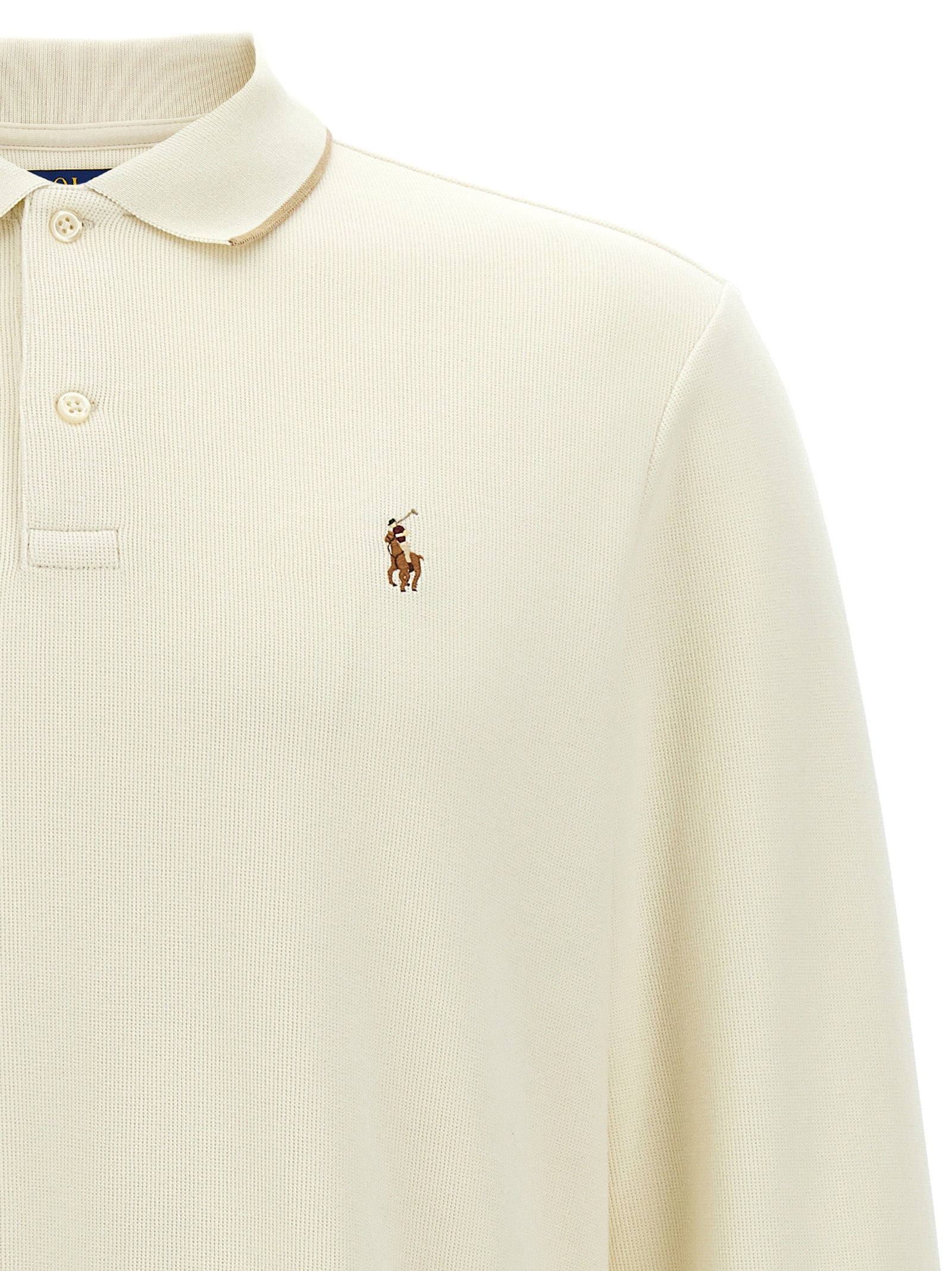 Chemise polo beige en coton de Polo Ralph Lauren, vue de face avec col et boutons visibles.