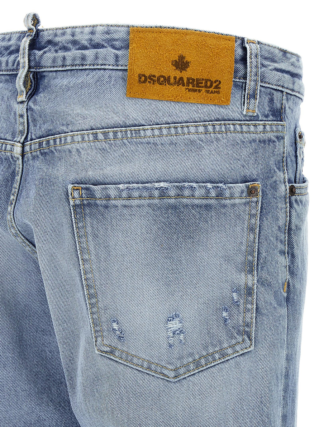 Jeans skinny en coton bleu de la marque Dsquared², ajustés et modernes, avec détails classiques visibles sur l'image.