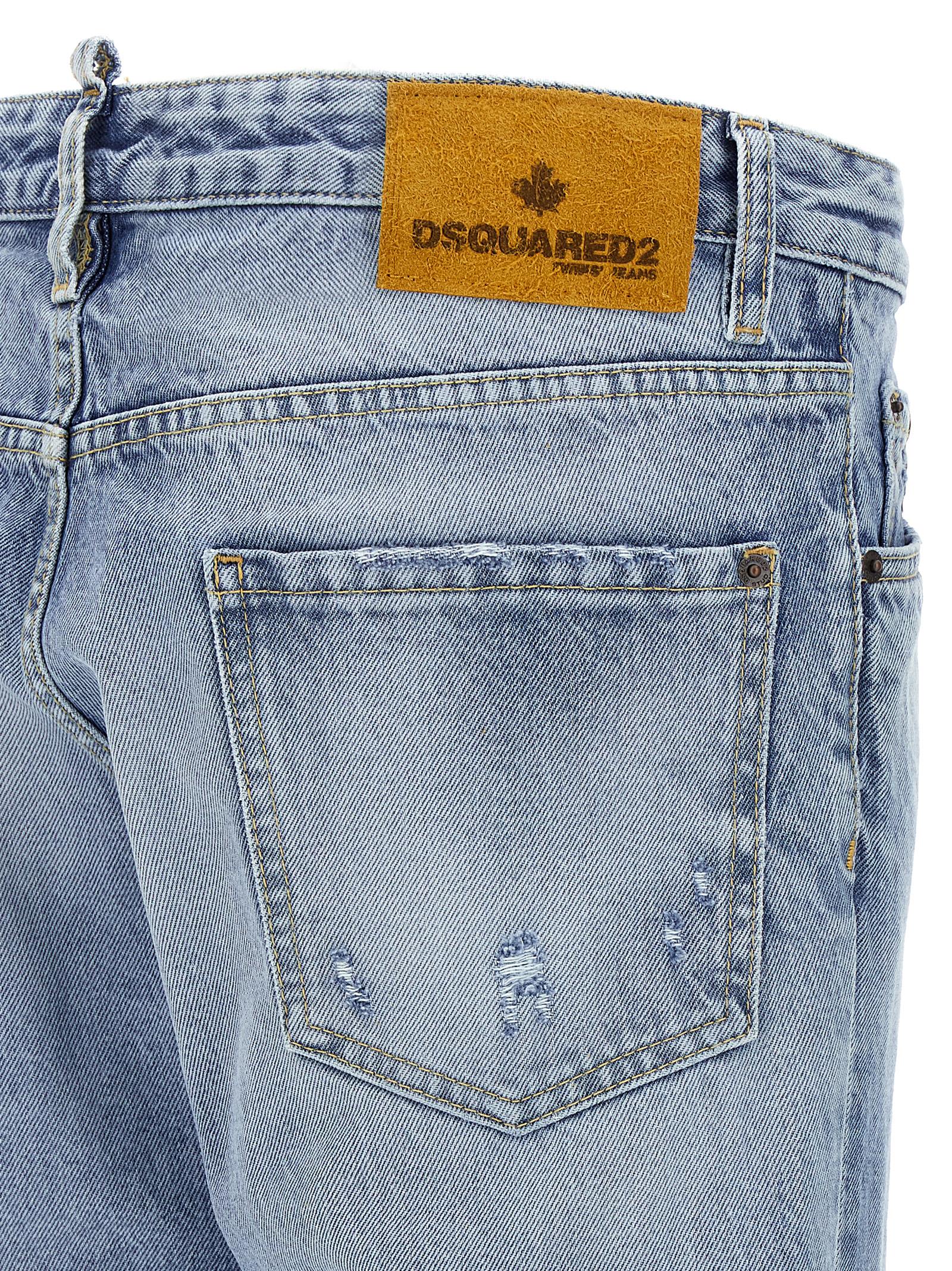 Jeans skinny en coton bleu de la marque Dsquared², ajustés et modernes, avec détails classiques visibles sur l'image.