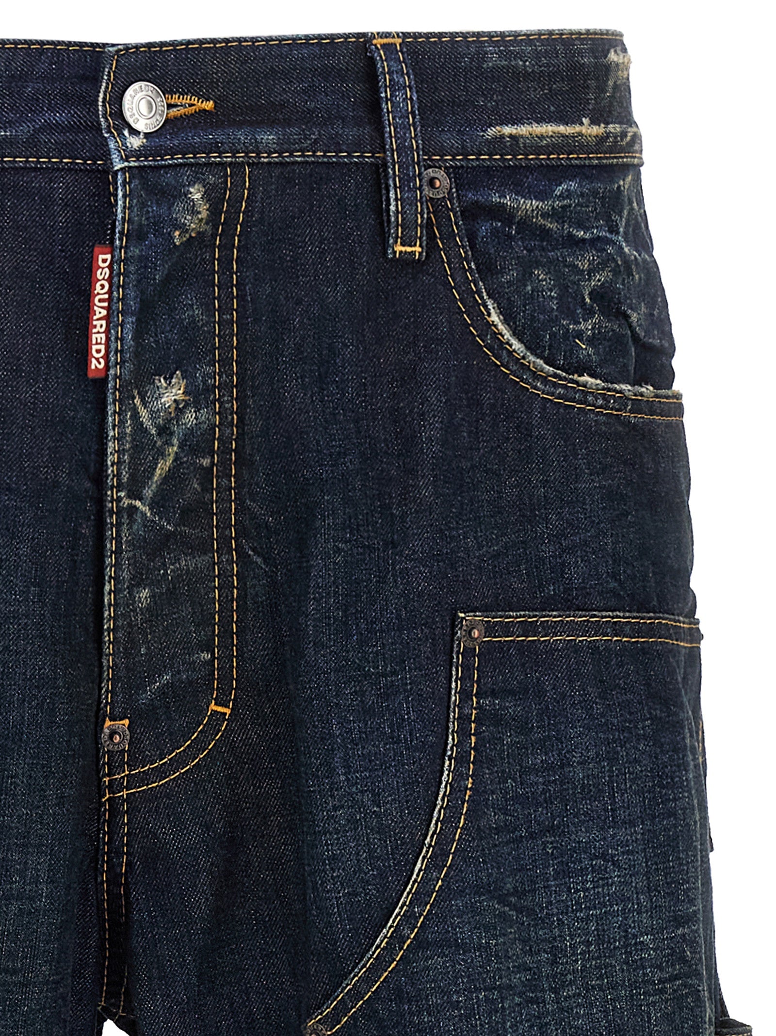 Jeans en denim en coton bleu Dsquared², coupe classique, visibles en gros plan sur fond neutre.