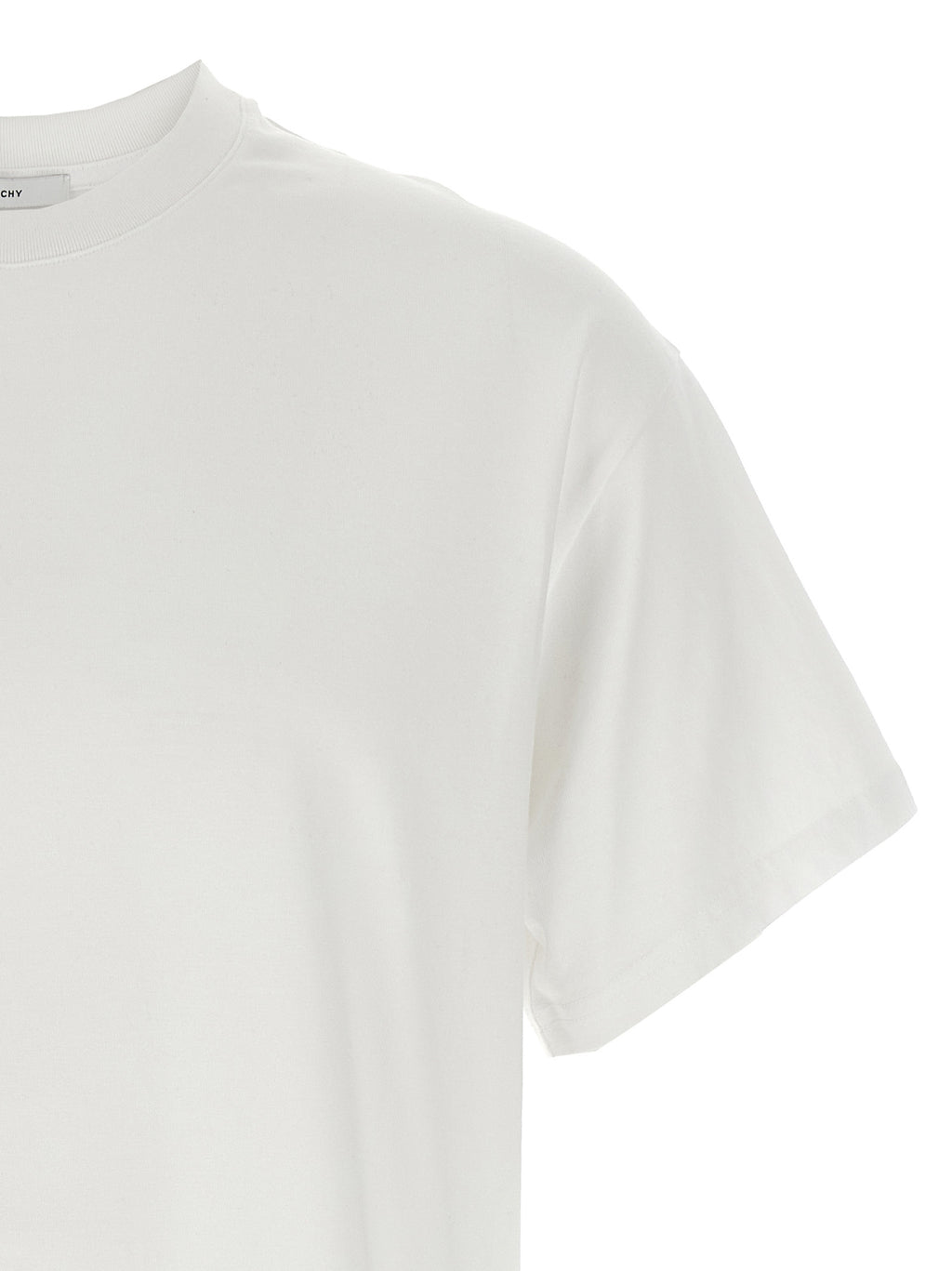 T-shirt blanc en coton de la marque Givenchy, vue de face, avec logo discret sur le devant.