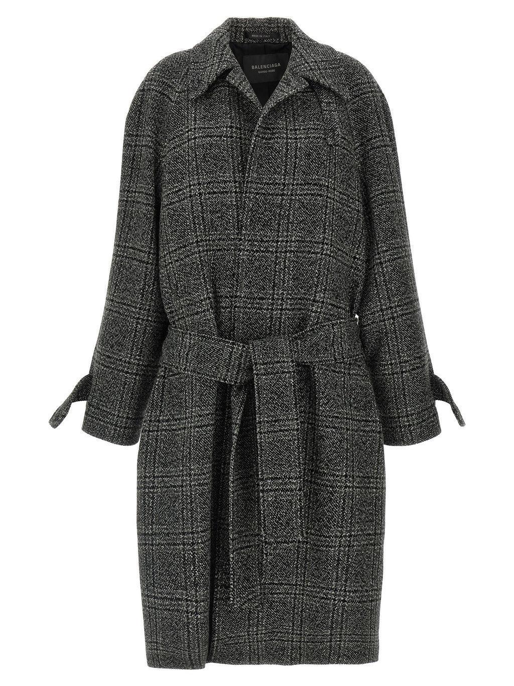 Manteau en laine noir Balenciaga avec col élégant et coupe structurée, présenté sur un fond neutre.
