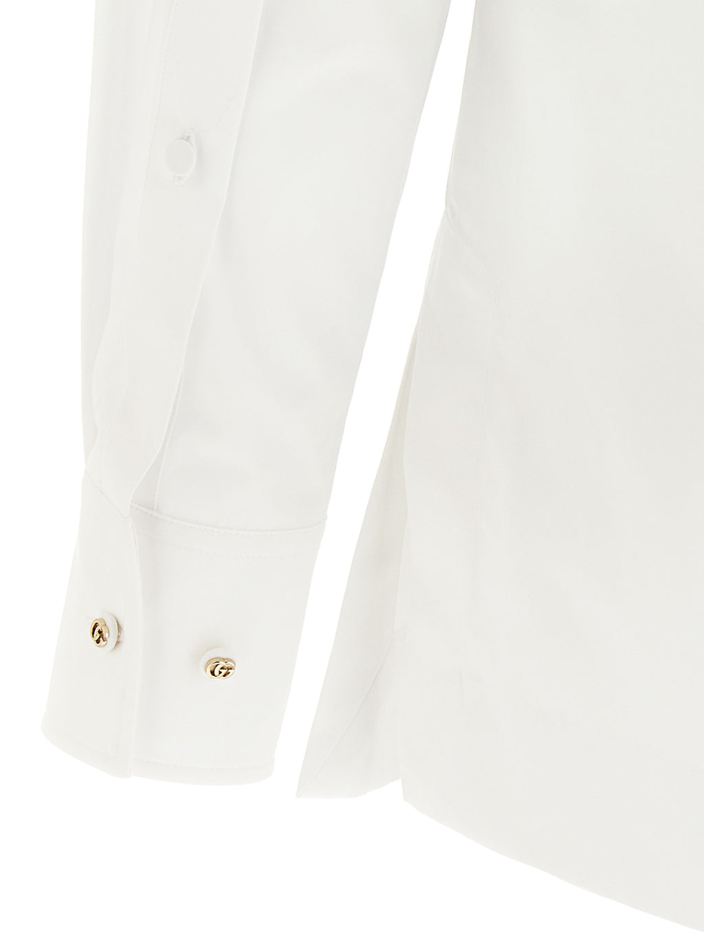 Chemise blanche en coton de Gucci, vêtement élégante avec logo discret, portée décontractée ou formelle.