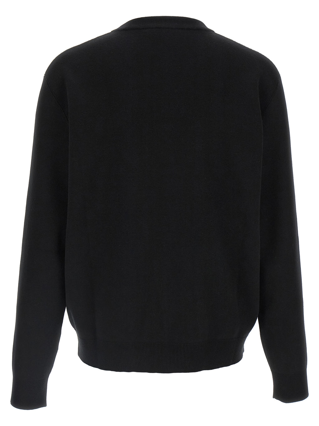 Cardigan en laine bicolore Gucci, coupe tendance, avec détails élégants, porté par un mannequin.