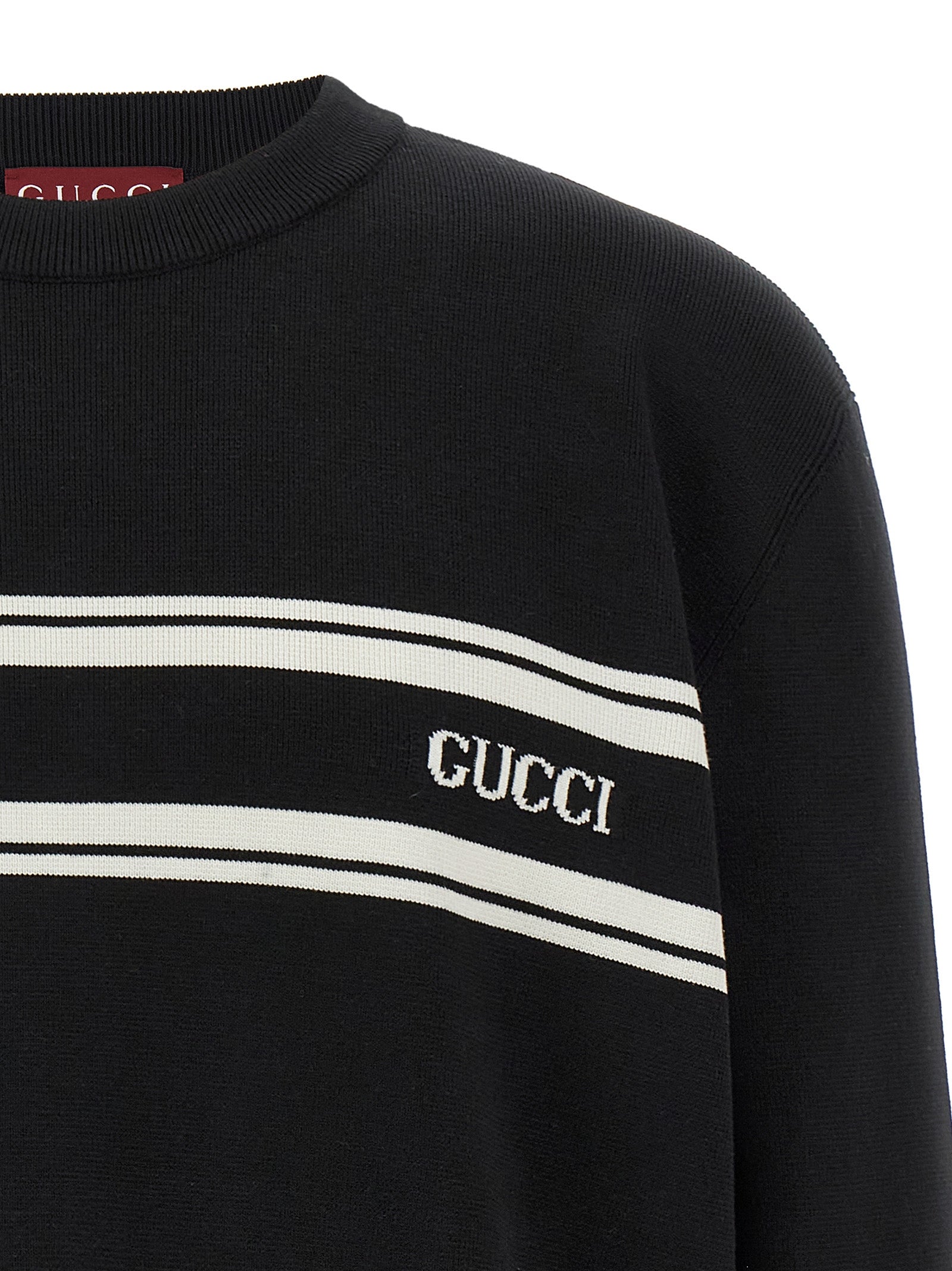 Cardigan en laine bicolore Gucci, à manches longues et col en V, style chic et élégant pour homme ou femme.