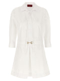 Robe courte en coton blanc de Gucci, élégante et légère, avec un design simple et sophistiqué.
