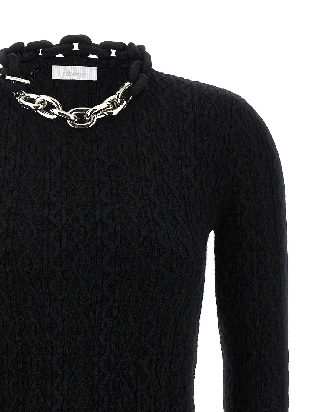 Cardigan en laine noire Paco Rabanne, coupe classique, détails modernes, porté sur un modèle.