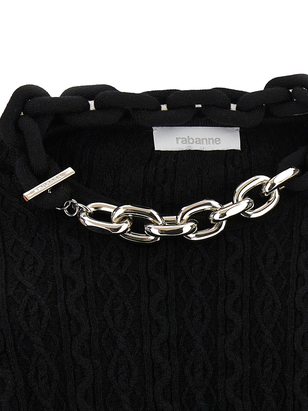 Cardigan en laine noire Paco Rabanne, classique et élégant, porté sur un mannequin.