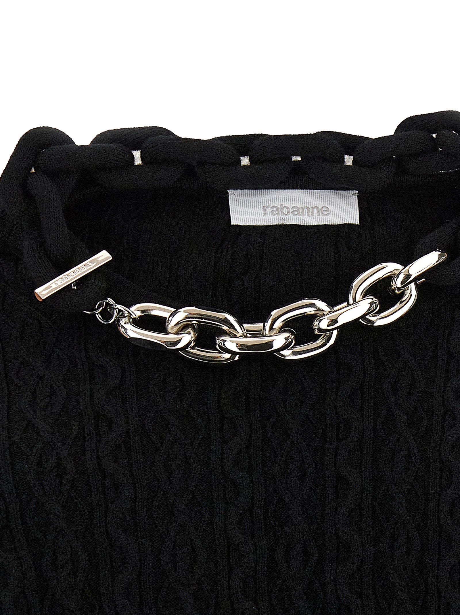 Cardigan en laine noire Paco Rabanne, classique et élégant, porté sur un mannequin.