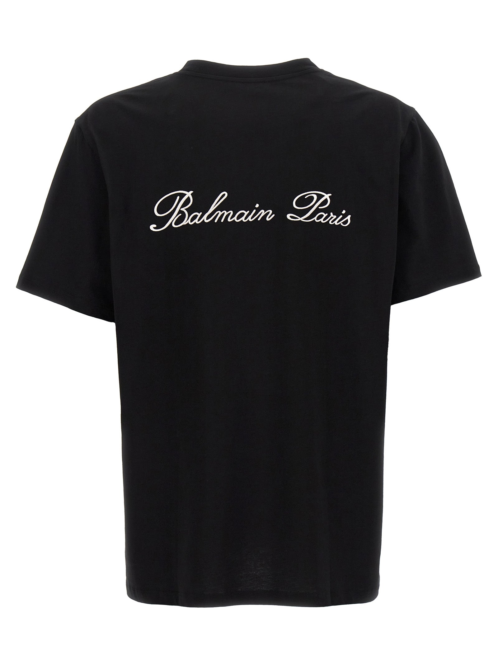 T-shirt en coton bicolore Balmain, coupe classique, avec logo Balmain visible, portée sur un mannequin blanc.