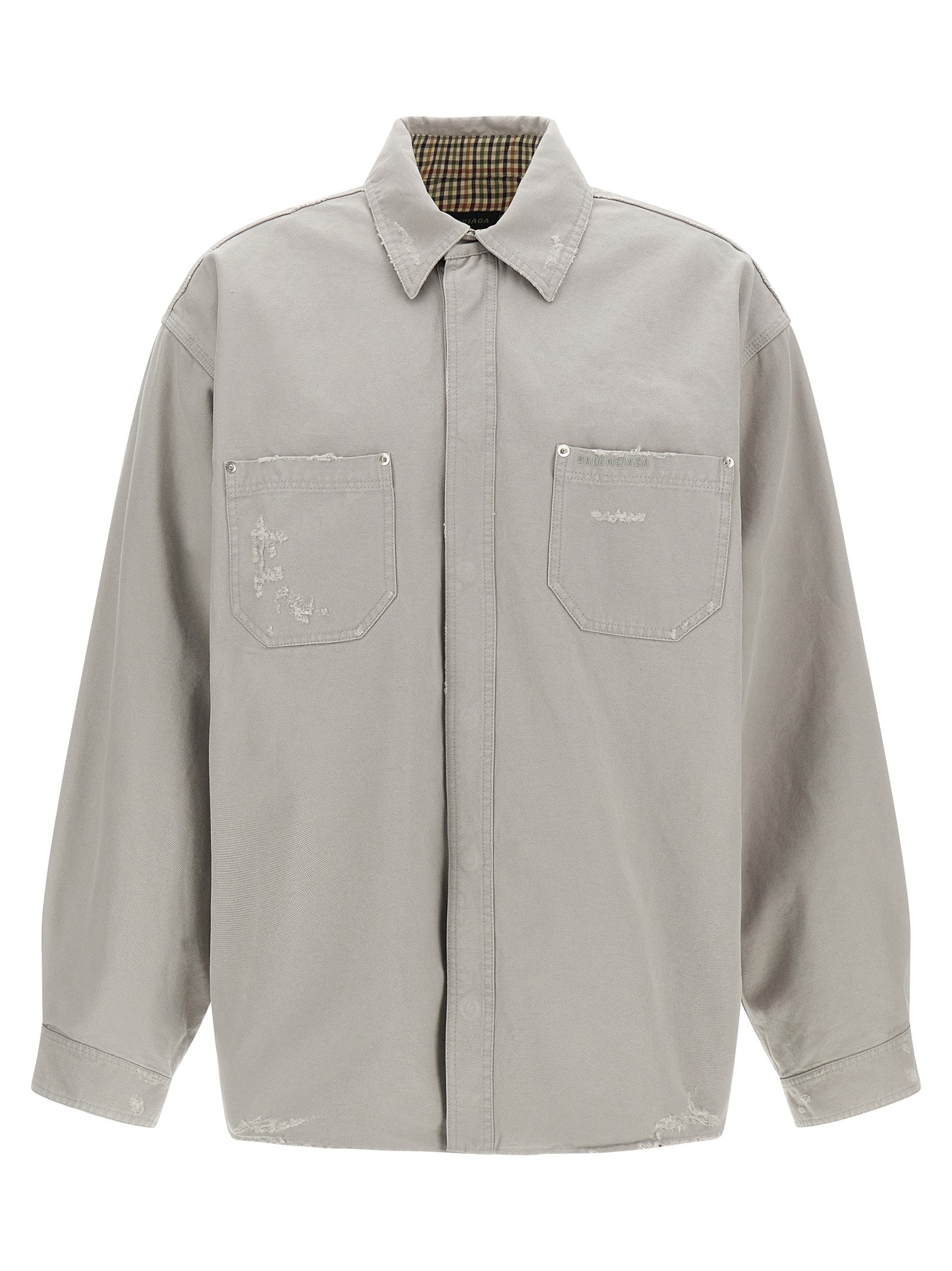 Chemisier gris en coton de la marque Balenciaga, montre le col, les manches longues et la coupe décontractée de la blouse.